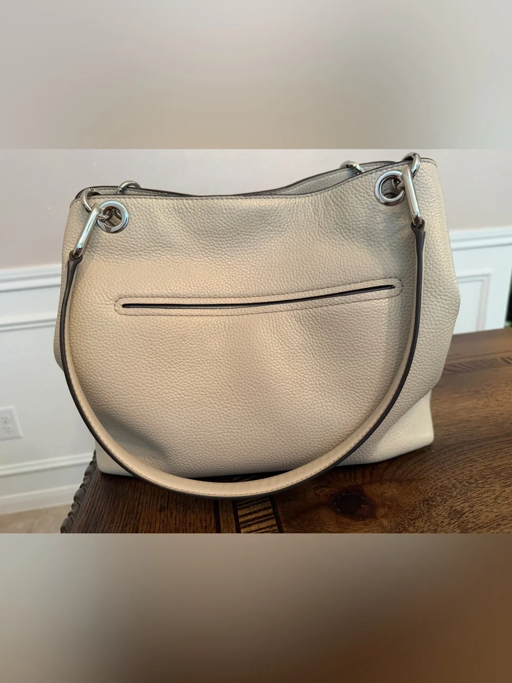 Michael Kors Raven pebbled leather shoulder bag featuring silver-tone hardware